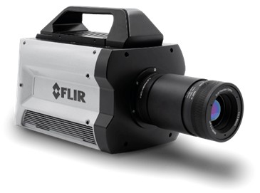 FLIR X8582-HS InSb thermal imaging camera in side view with a long lens. On the side of the camera is the FLIR logo.